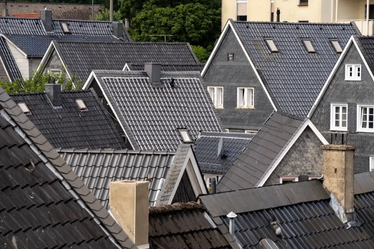 Steep roof eaves and gutter lines on houses in Joliet, IL